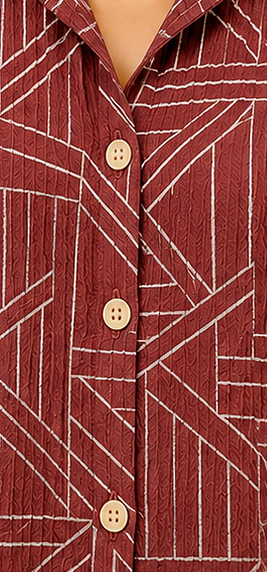 Close-up of the maroon and off-white geometric print on crinkled cotton
