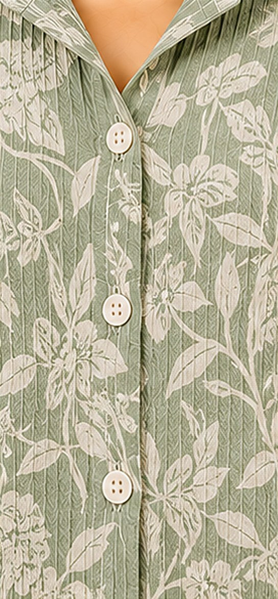 Close-up of the sage green floral and leaf print on crinkled cotton